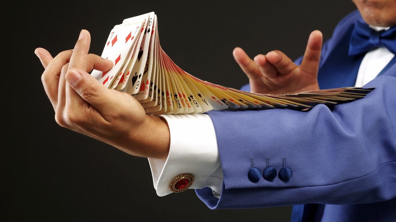 pocket money performer magician doing a card trick